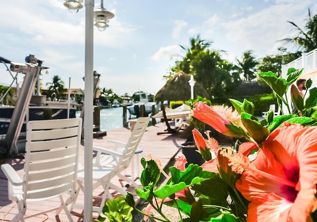 surrounding community featuring a water view