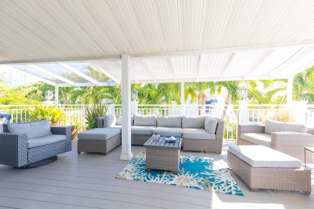 deck with outdoor lounge area and a pergola