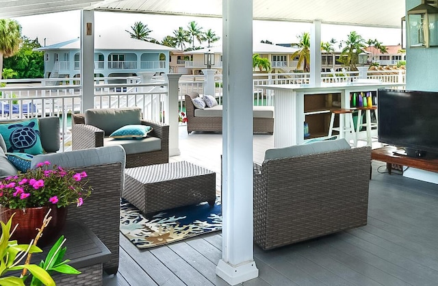 balcony with an outdoor hangout area