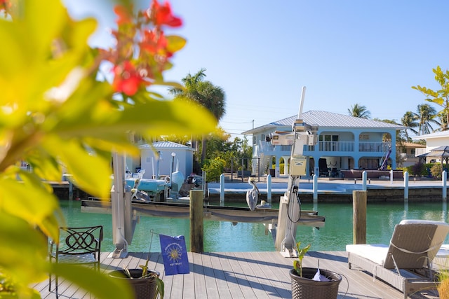 view of dock with a water view