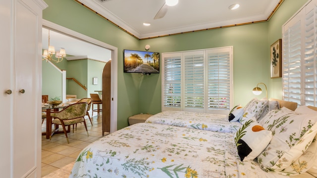 tiled bedroom featuring crown molding and ceiling fan with notable chandelier