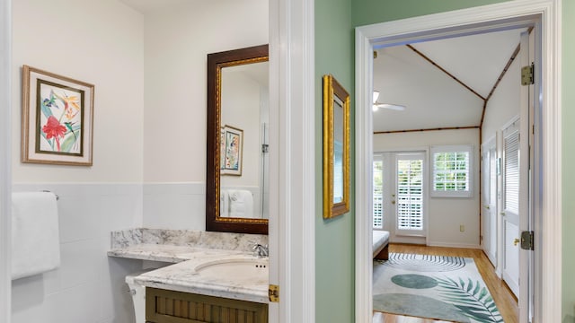 bathroom with vanity and wood-type flooring