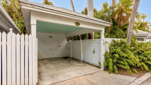 exterior space featuring a carport