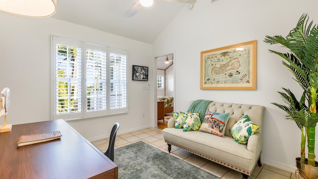 office space featuring lofted ceiling, light tile patterned floors, and ceiling fan