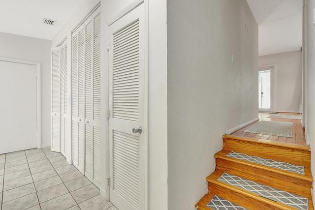 462 Sunset Dr, Key Largo, FL 33037 - stairs with tile patterned floors