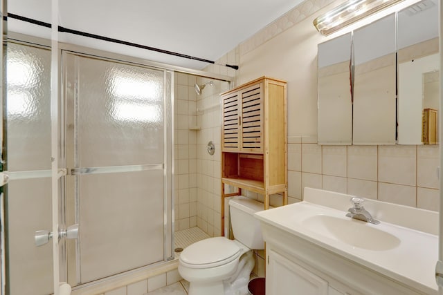 462 Sunset Dr, Key Largo, FL 33037 - full bathroom featuring tile walls, a shower stall, toilet, and vanity