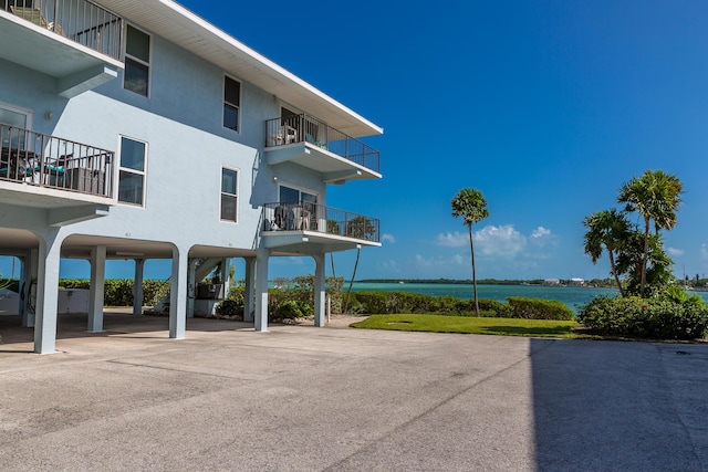 exterior space with a water view