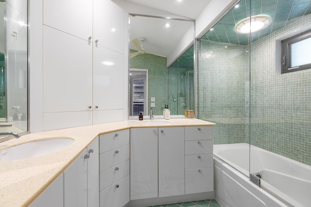 1511 S Street, Key West, FL 33040 - bathroom featuring double vanity, lofted ceiling,  shower combination, and tile patterned floors