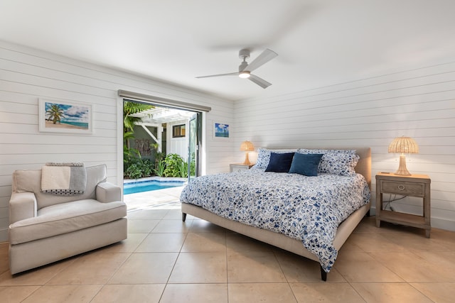 1511 S Street, Key West, FL 33040 - bedroom with access to outside, light tile patterned flooring, wooden walls, and a ceiling fan