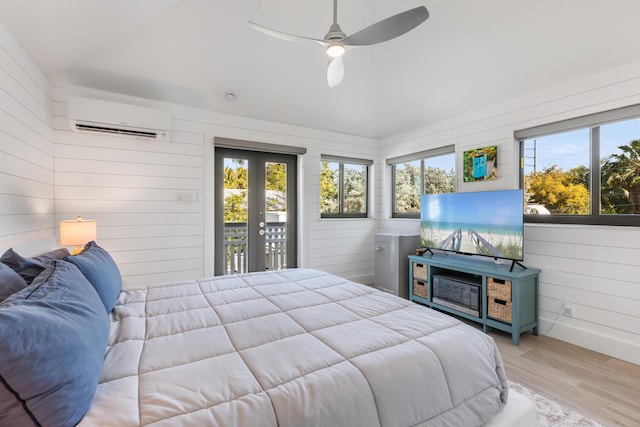 1511 S Street, Key West, FL 33040 - bedroom with a wall mounted air conditioner, wood walls, access to outside, lofted ceiling, and wood finished floors