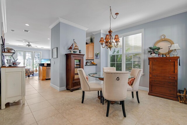 144 Anglers Way, Islamorada, FL 33036 - kitchen featuring stainless steel appliances, light brown cabinetry, a peninsula, ornamental molding, and a sink
