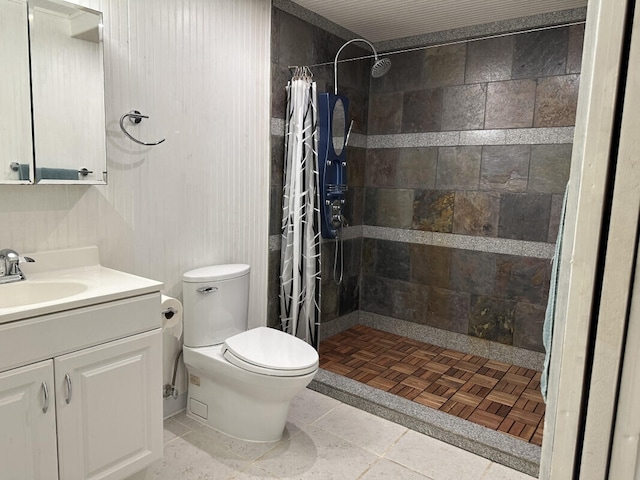 bathroom featuring vanity, a shower with curtain, and toilet