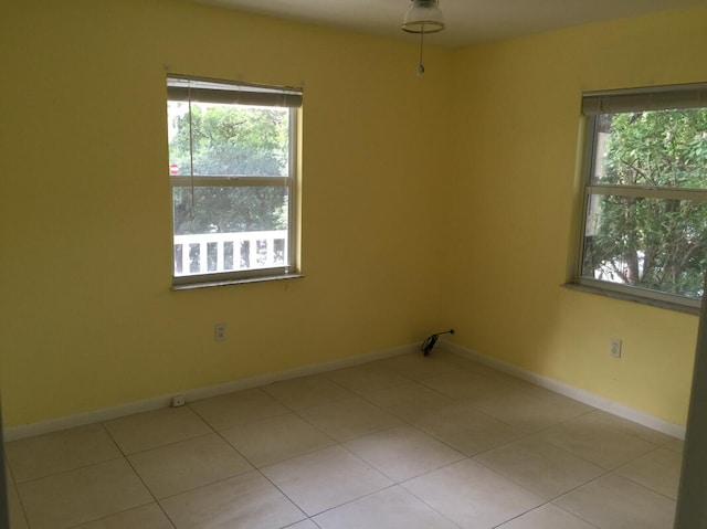 empty room featuring light tile patterned flooring