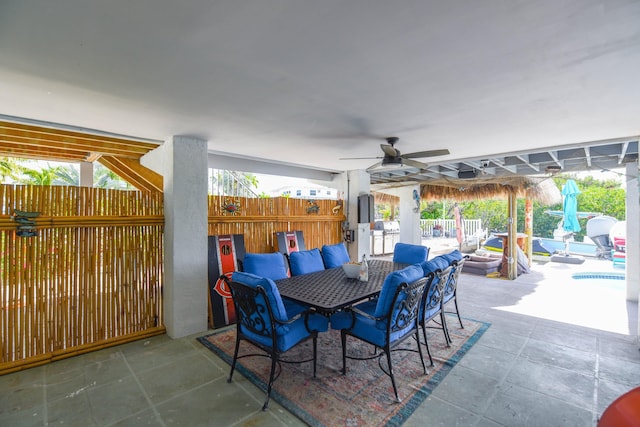 view of patio featuring ceiling fan