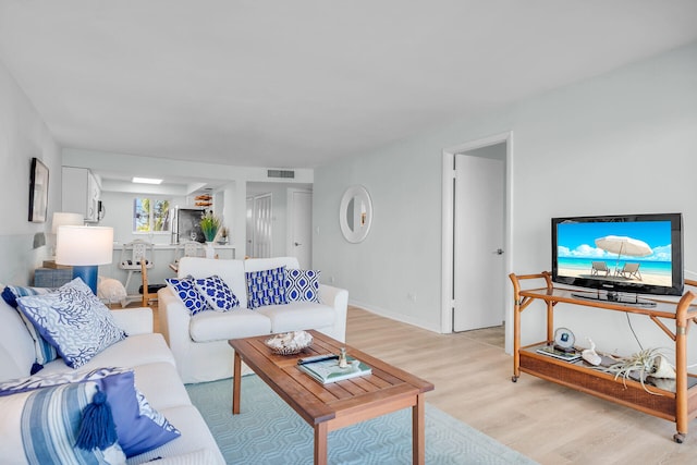 living room featuring light hardwood / wood-style floors