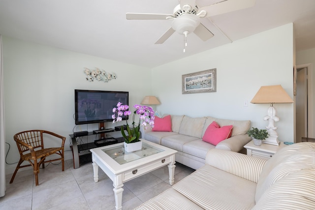 living room with light tile patterned floors and ceiling fan