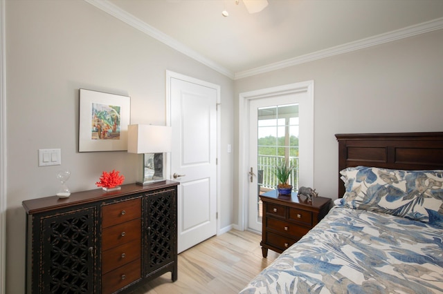 bedroom with ornamental molding, light hardwood / wood-style flooring, and access to outside