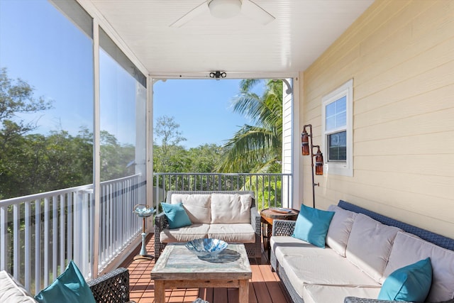 sunroom / solarium featuring ceiling fan and a healthy amount of sunlight