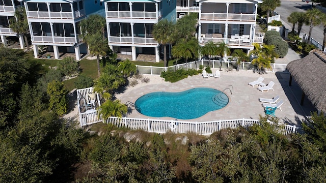 view of swimming pool featuring a patio area