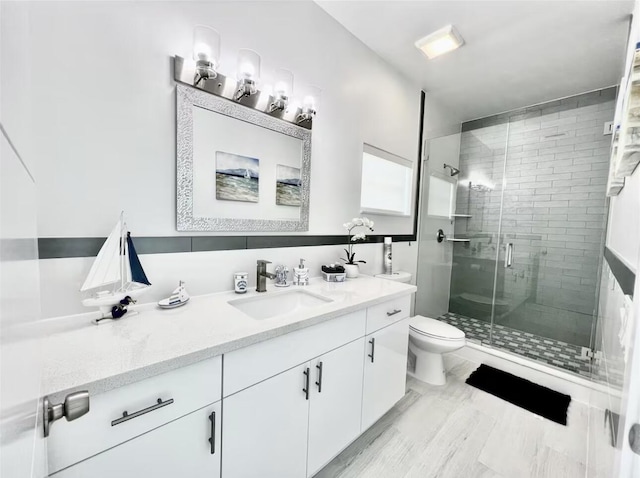 1021 82nd St, Marathon, FL 33050 - bathroom featuring a stall shower, toilet, and vanity