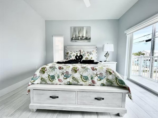1021 82nd St, Marathon, FL 33050 - bedroom with baseboards, access to exterior, and a ceiling fan