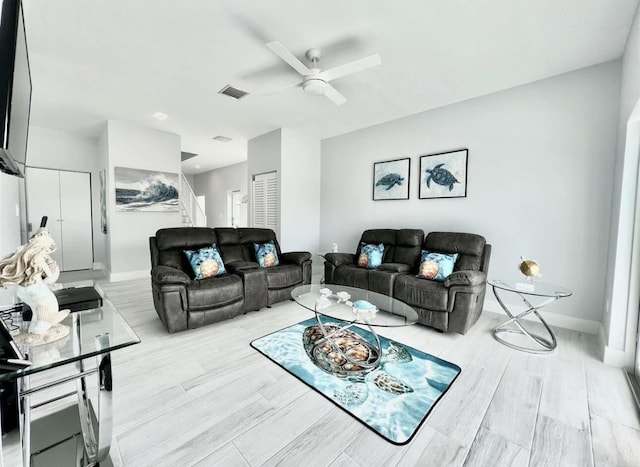 1021 82nd St, Marathon, FL 33050 - living room with visible vents, baseboards, light wood-style flooring, and a ceiling fan