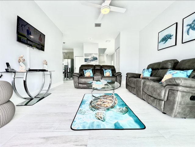 1021 82nd St, Marathon, FL 33050 - living room featuring light wood finished floors, visible vents, baseboards, and a ceiling fan