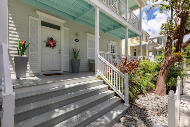 doorway to property featuring a porch