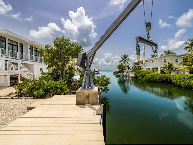 dock area with a water view