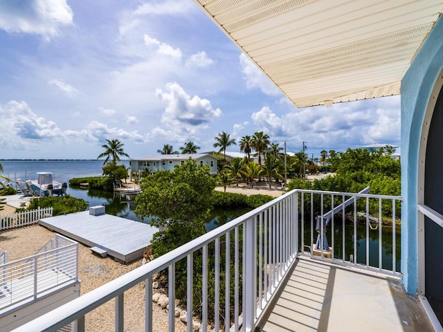 balcony featuring a water view