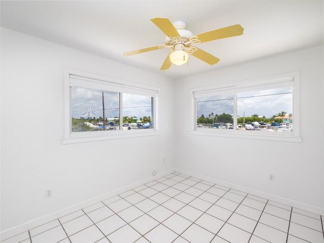 unfurnished room with ceiling fan