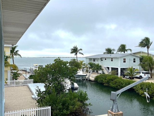 property view of water with a dock