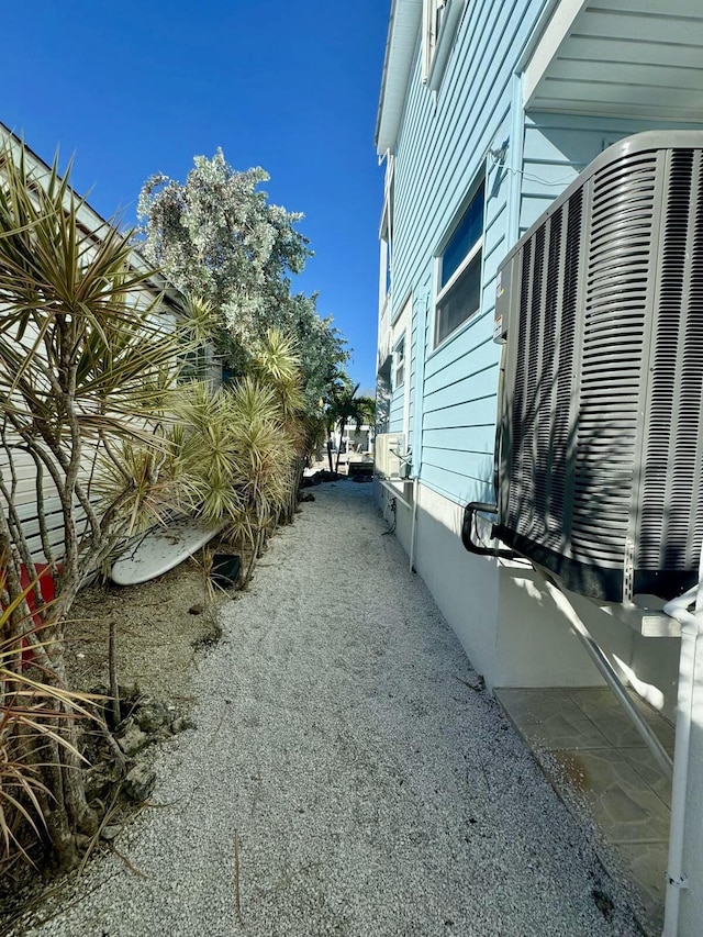 view of home's exterior featuring central AC unit