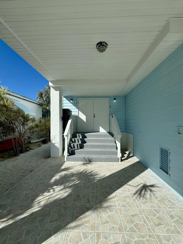 view of patio featuring visible vents