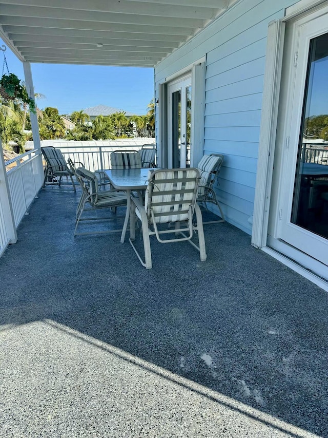 view of patio with french doors and outdoor dining space