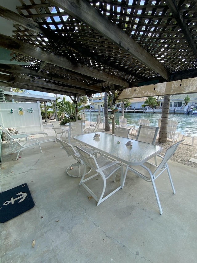 view of patio / terrace with a water view