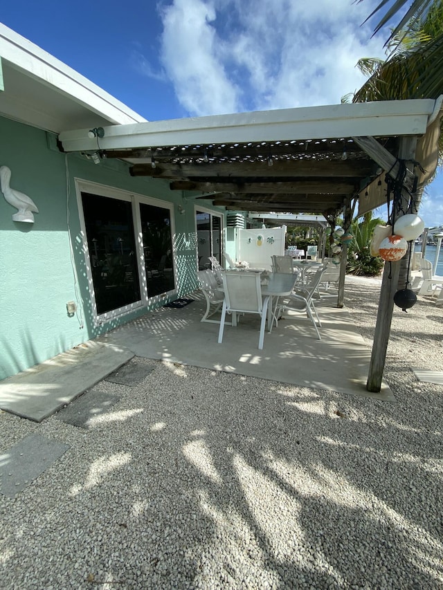 591 9th St, Key Colony, FL 33051 - view of patio / terrace with outdoor dining area