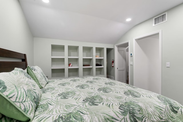 bedroom featuring lofted ceiling