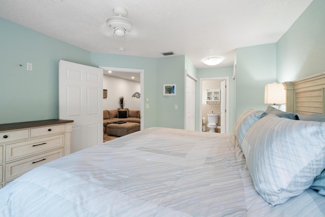 bedroom featuring connected bathroom