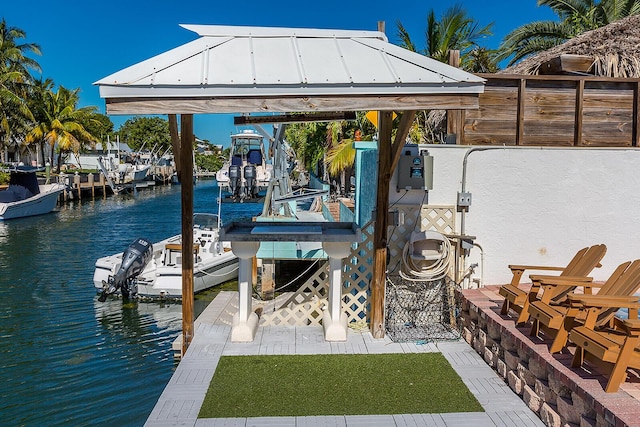 view of dock with a water view