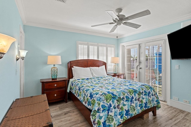 bedroom with ceiling fan, access to exterior, ornamental molding, light hardwood / wood-style floors, and french doors