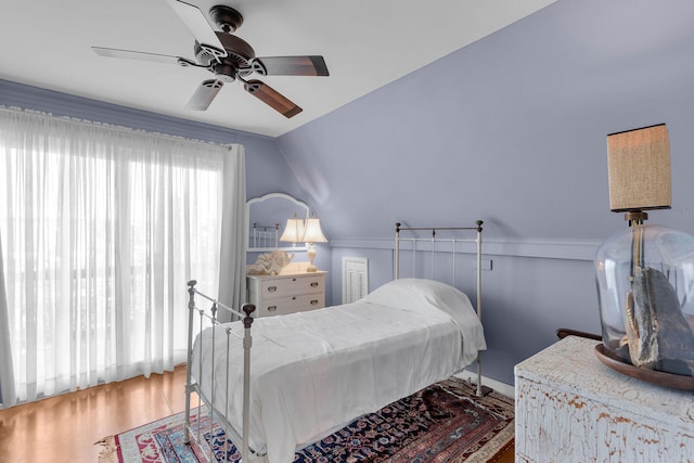 bedroom featuring wood-type flooring and ceiling fan