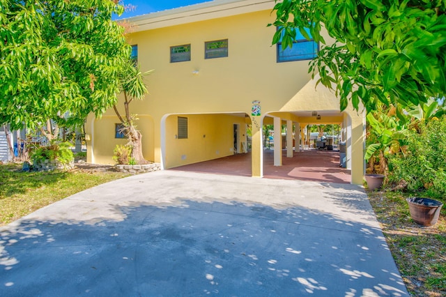 view of front facade with a carport