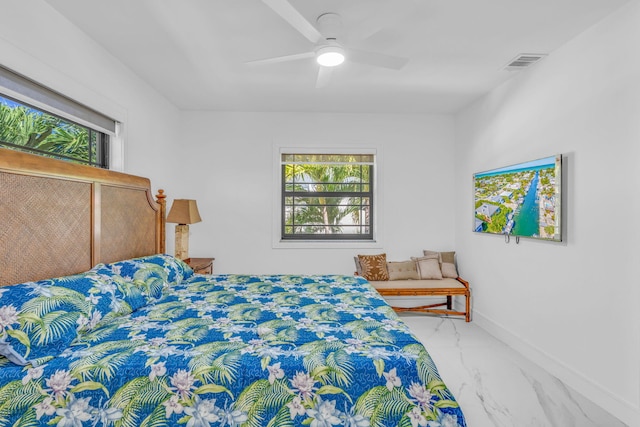 bedroom featuring ceiling fan