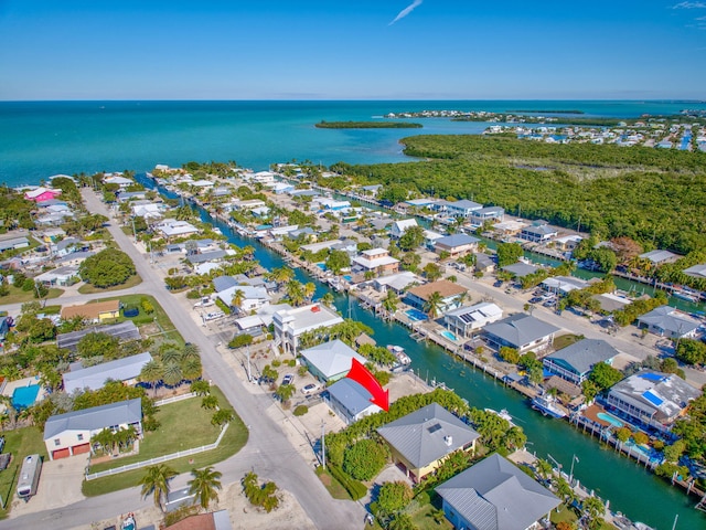 drone / aerial view with a water view