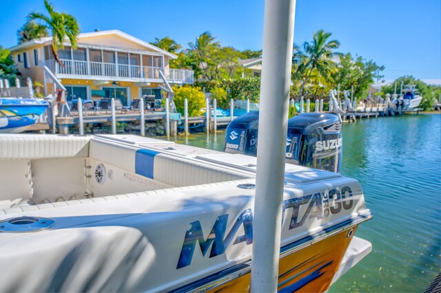 dock area with a water view