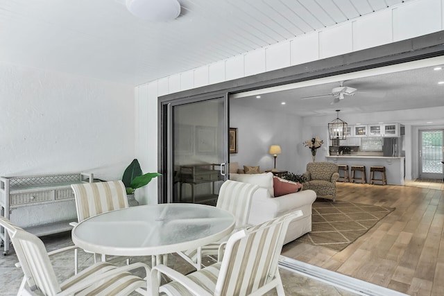 view of patio featuring ceiling fan