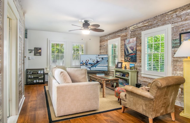 interior space with ceiling fan and hardwood / wood-style floors