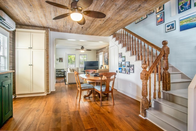 dining area featuring wood ceiling, light hardwood / wood-style floors, and an AC wall unit