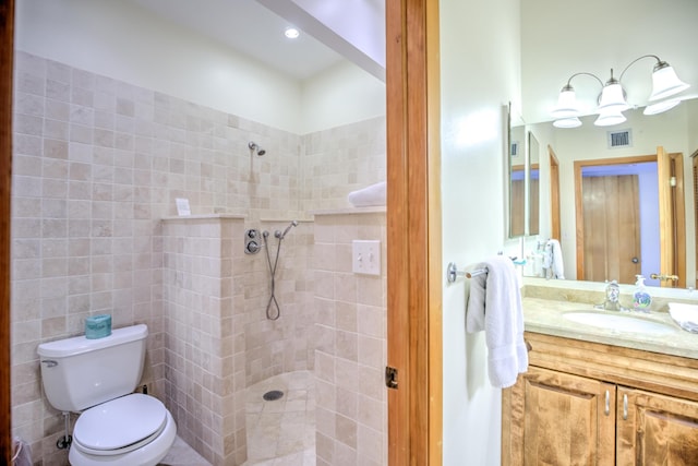 1133 W Ocean Dr Unit 2, Key Colony, FL 33051 - full bathroom featuring vanity, an inviting chandelier, toilet, visible vents, and tiled shower